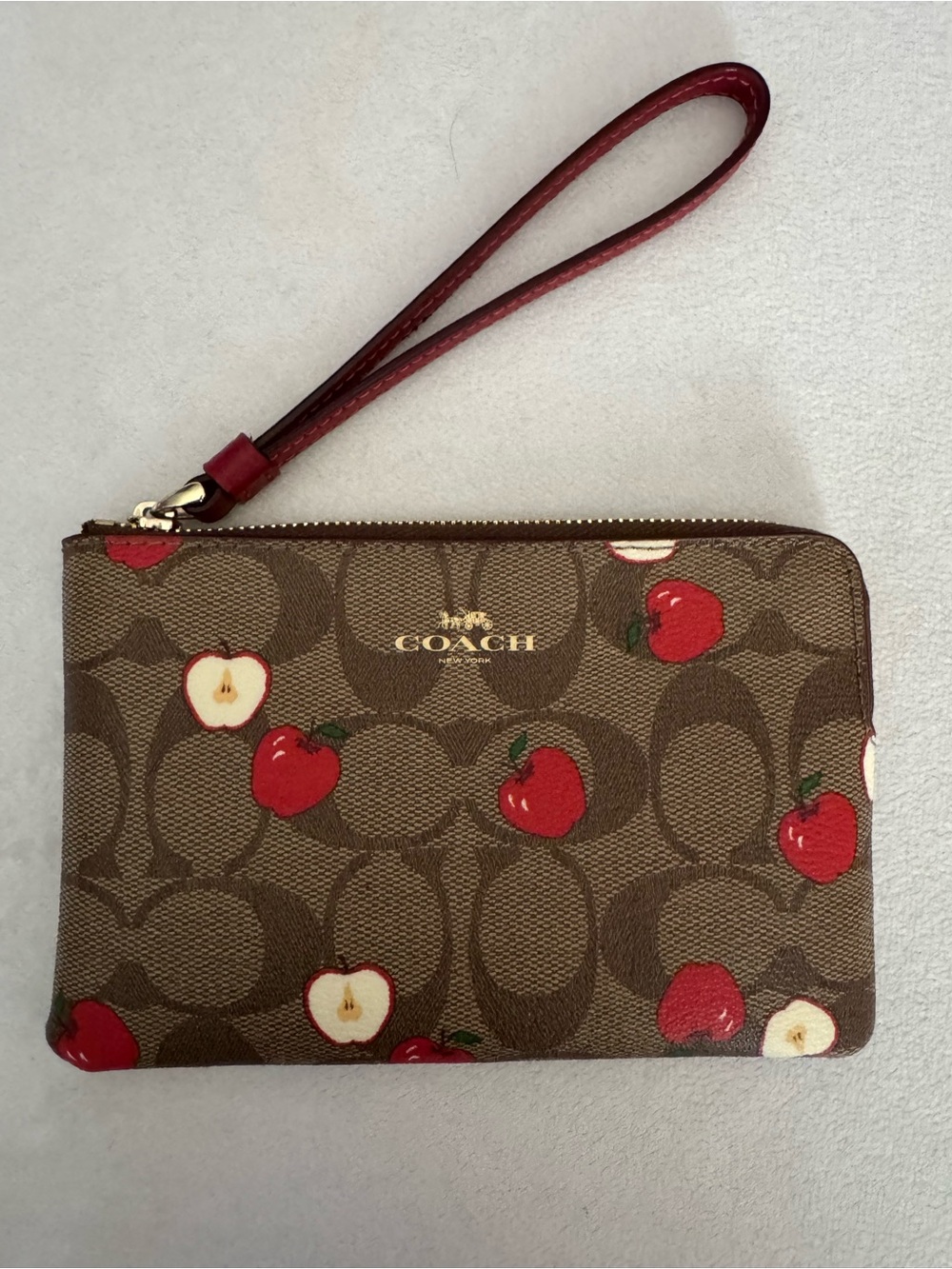 Coach Brown Signature Canvas Wristlet with Red Apple Print